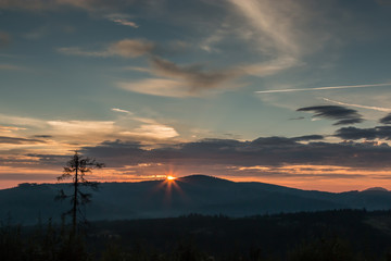 Spectacular sunrise in Tatra Mountains with various cloud types