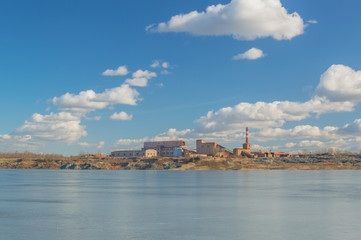 old factory on the shore of the lake.