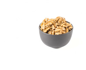 shelled walnuts on a white background