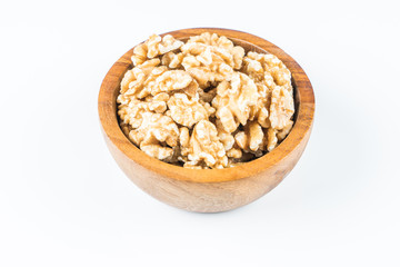shelled walnuts on a white background