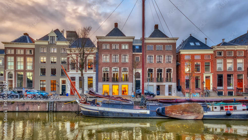 Canvas Prints old buildings on quay with ship