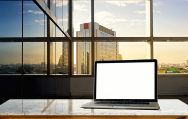 Fototapeta na wymiar Laptop on granite top table in office. for graphic design montage.
