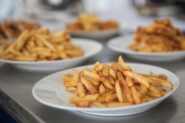 French fries and meat on the table