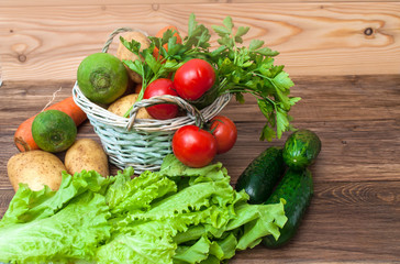 Mix of fresh vegetables on a wooden table. The concept of a healthy diet