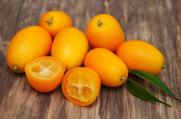 Kumquats on a wooden table