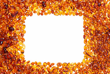 Yellow amber stones on a white background.