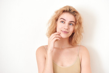 Portrait of a girl blonde on white background