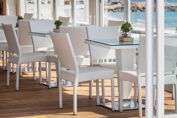 Modern cafe interior with white furniture