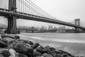Manhattan Bridge and Downtown Manhattan view on foggy day