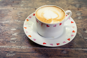 latte coffee on wood table with space