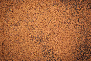 pile cocoa powder,Background of a dry powder cocoa brown,heap of fresh cacao powder,Cocoa powder top view background