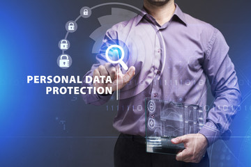 Business, Technology, Internet and network concept. Young businessman working on a virtual screen of the future and sees the inscription: Personal data protection