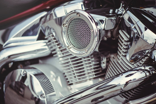chrome motorcycle air filter and the engine, mild toning