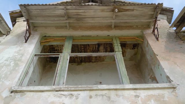 13328_The_old_window_from_the_damaged_house_in_Ukraine.mov