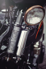 vintage motorcycle headlight and spingola plug, soft toning in dark colors for the calendar
