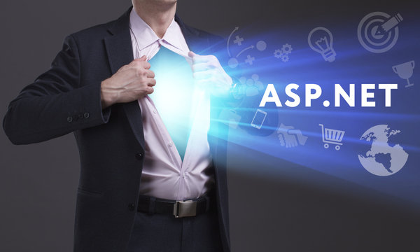 Business, Technology, Internet and network concept. Young businessman shows the word: ASP.NET