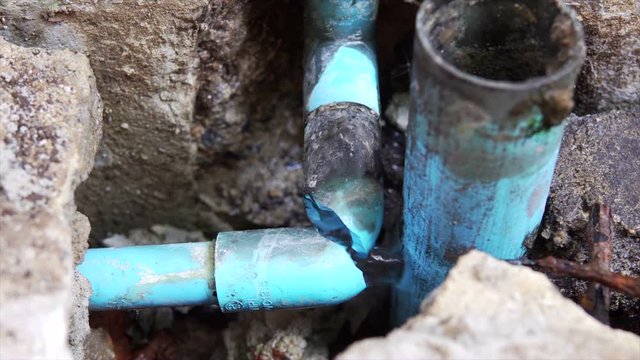 plumbing water leak from pipe under concrete floor