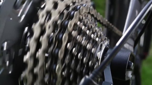 Close-up on rear bike cassette rotation.