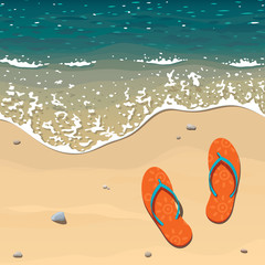 Два оранжевых пляжных тапочка на песчаном берегу возле кромки прибоя, морская волна с пеной наползает на берег
