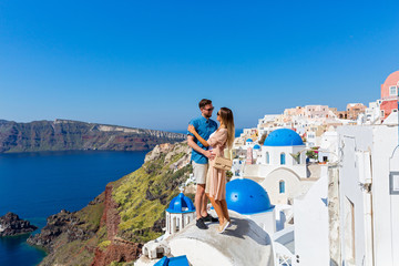 Young couple on island of Santorini