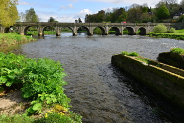 Fototapeta na wymiar The road bridge that spans the River Nore at Inistioge in Ireland