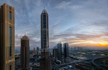 Fototapeta na wymiar Sunset window view of Dubai city