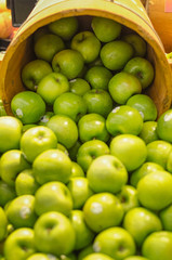 Bunch of green apples in supermarket