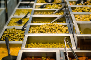 Variety of olives in supermarket