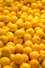 Organic yellow plum in supermarket