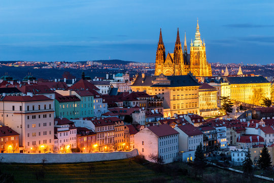 Prague, Czech Republic. Hradcany (Prague Castle) with St. Vitus Cathedral and St. George church evening dusk, Bohemia landmark in Praha.