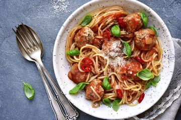 Spaghetti with meatballs in tomato sauce.Top view.