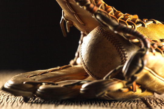 Close up image of an old used baseball