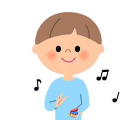 男の子  カスタネットをたたく