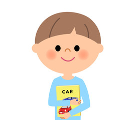 男の子　本を抱く