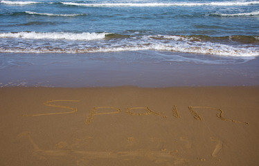 Inscription on the sand Spain
