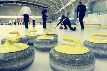Curling stone on a game sheet.