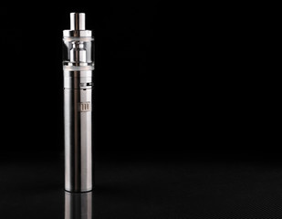 electronic cigarette or vaping device on black background