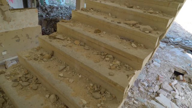 13341_Closer_look_of_the_rubbles_and_stones_on_the_stairs.mov