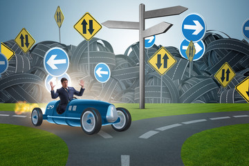 Confused businessman driving car im uncertainty