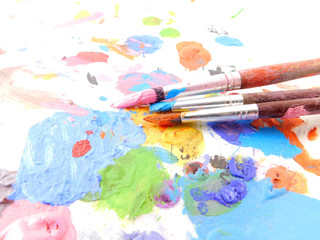 Obraz premium Paint palette and brushes.