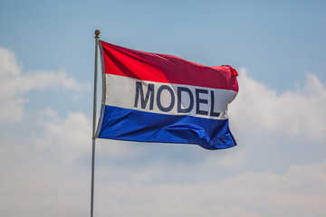 MODEL flag blowing in the wind