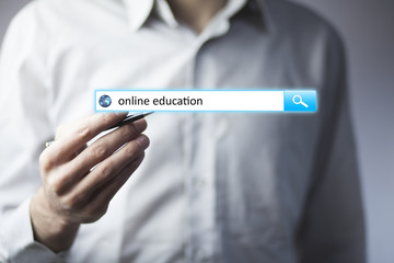 man hand touching online education text
