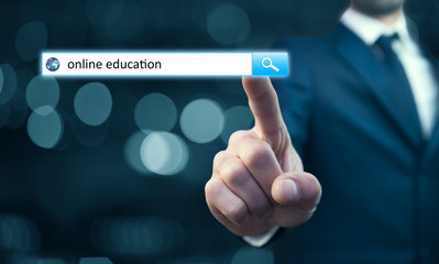 man hand touching online education text