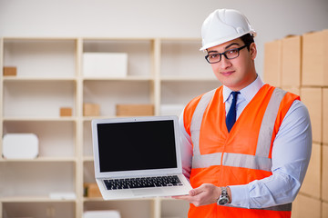Man working in postal parcel delivery service office