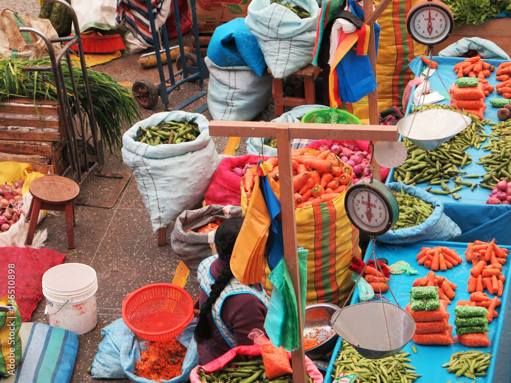 Wall mural Women in the market in Urubamba in the Sacred Valley near Machu Picchu, Cusco