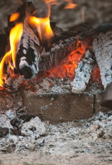 Burning fire in fireplace outdoor