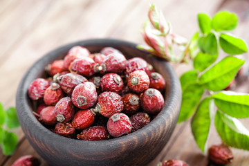 Dog rose or rosehip berries with leaves, dried briar