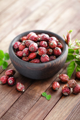 Dog rose or rosehip berries with leaves, dried briar