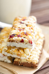 Delicious granola bars with oat, honey and yogurt, healthy food for breakfast. Homemade cereal snacks for healthy eating