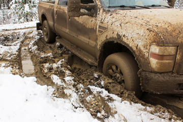 A vehicle stuck in the clay